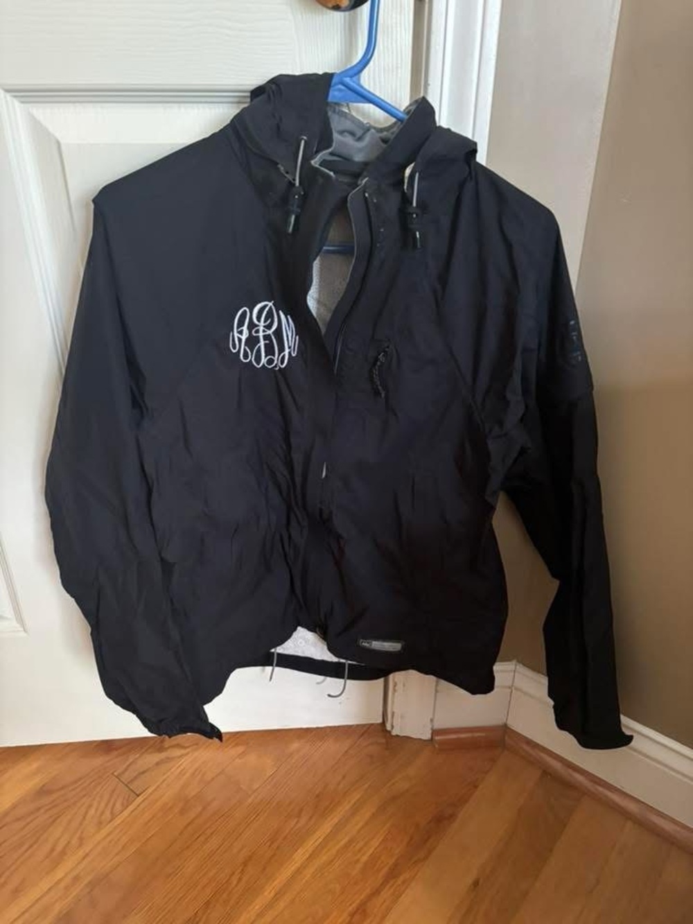 Black Hooded Rain Jacket with White Monogram